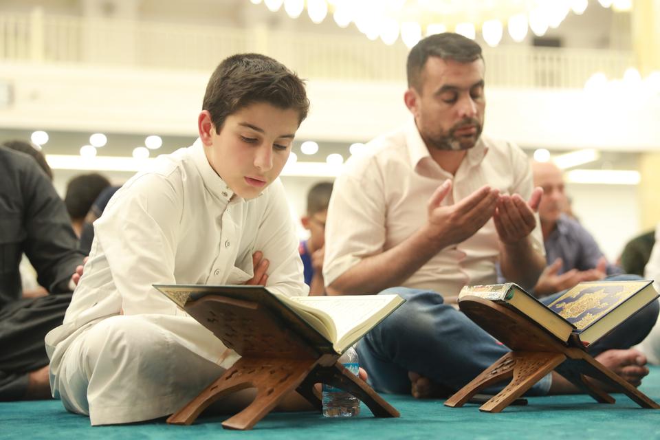 Muslims read the holy Quran during the Laylat al Qadr in Erbil, Iraq.