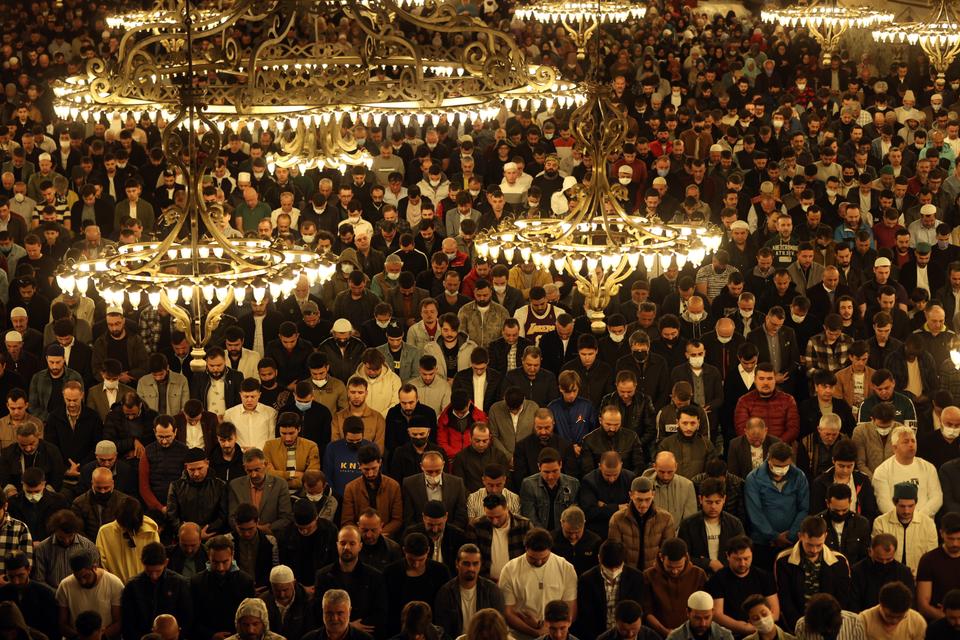 Thousands of Muslims perform prayer at and outside Ayasofya Grand Mosque during the Laylat al Qadr in Istanbul, Türkiye.
